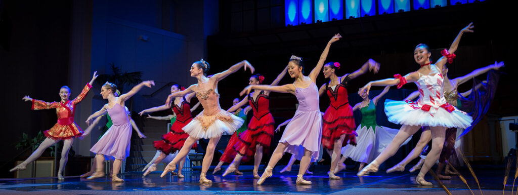 Ballerinas dance on a stage