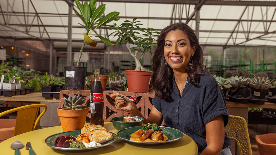 Fort Worth Foodie Crystal Vastine enjoys a meal at Archie's Gardenland surrounded by beautiful plants