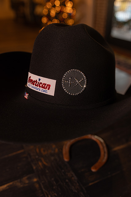 An American Hat Company hat with Keith's "Positive Times" brand.