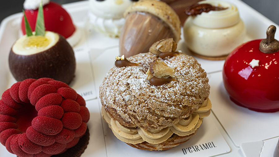 A variety of sweets from D'Caramel Patisserie, including offerings designed to look like a raspberry and an acorn.