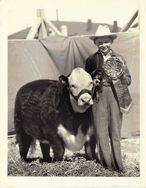 Oliver Grote stands with his champion steer