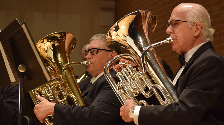 Members of the Southlake Community Band perform together.