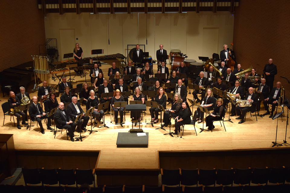 Southlake Community Band members on stage for a performance