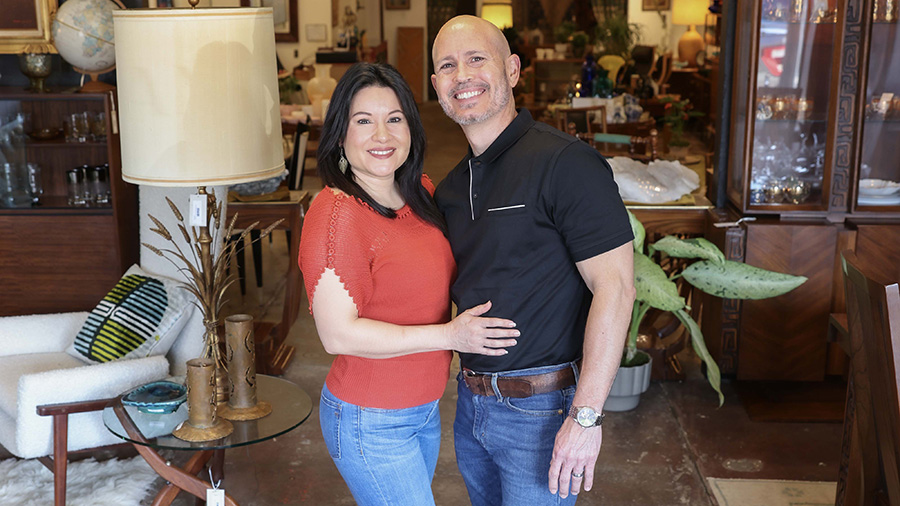 Dahlia and Jonathan Bermudez stand together in their new Boomerang Boutique.